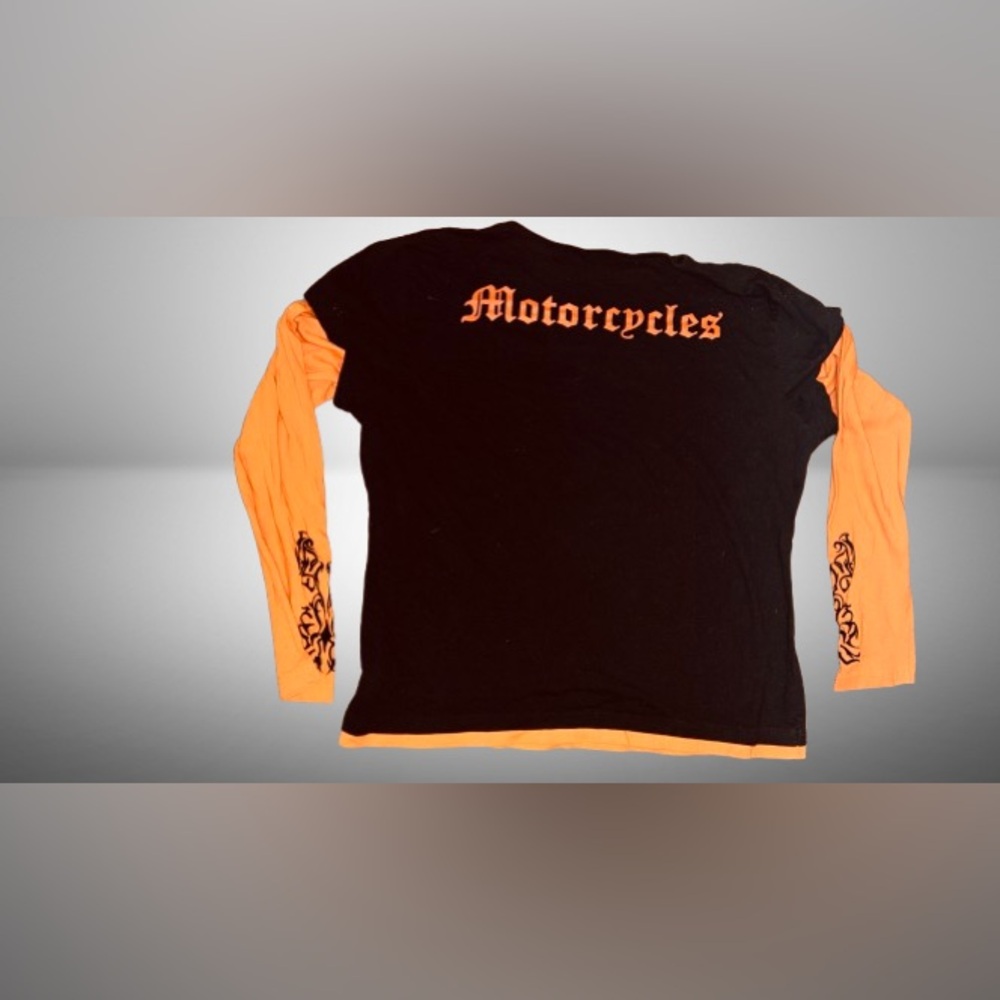 Woman’s XL black and orange Harley Davidson Shirt